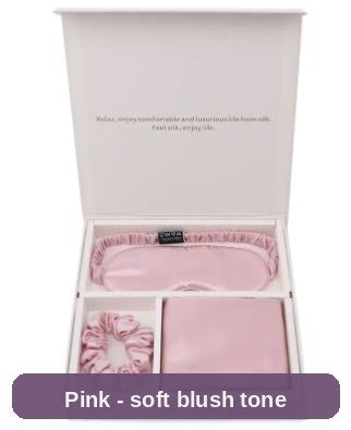 Silk Sleep Gift Set in pink - mask, pillowcase and scrunchie in a soft blush tone.