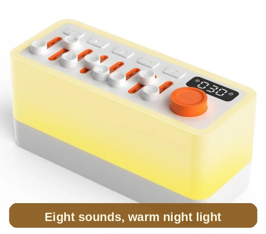 White Noise Machine glowing warm yellow - eight soothing sounds with a soft night light for the bedside.