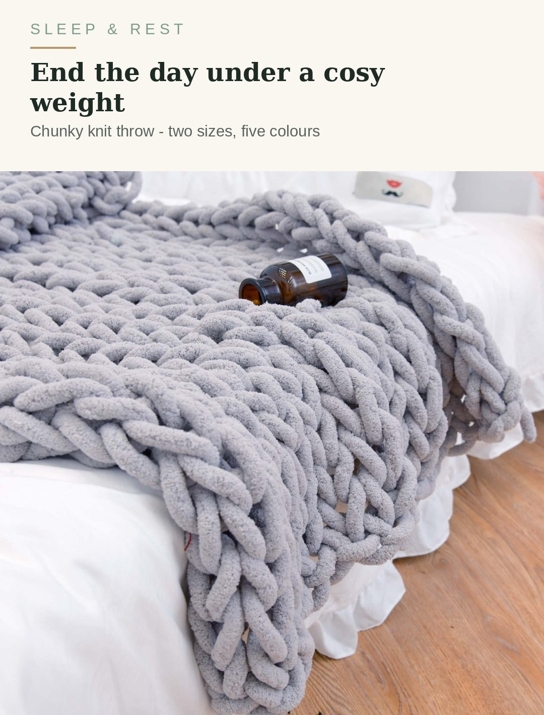 Chunky knitted weighted blanket draped over a bed - end the day under a cosy weight
