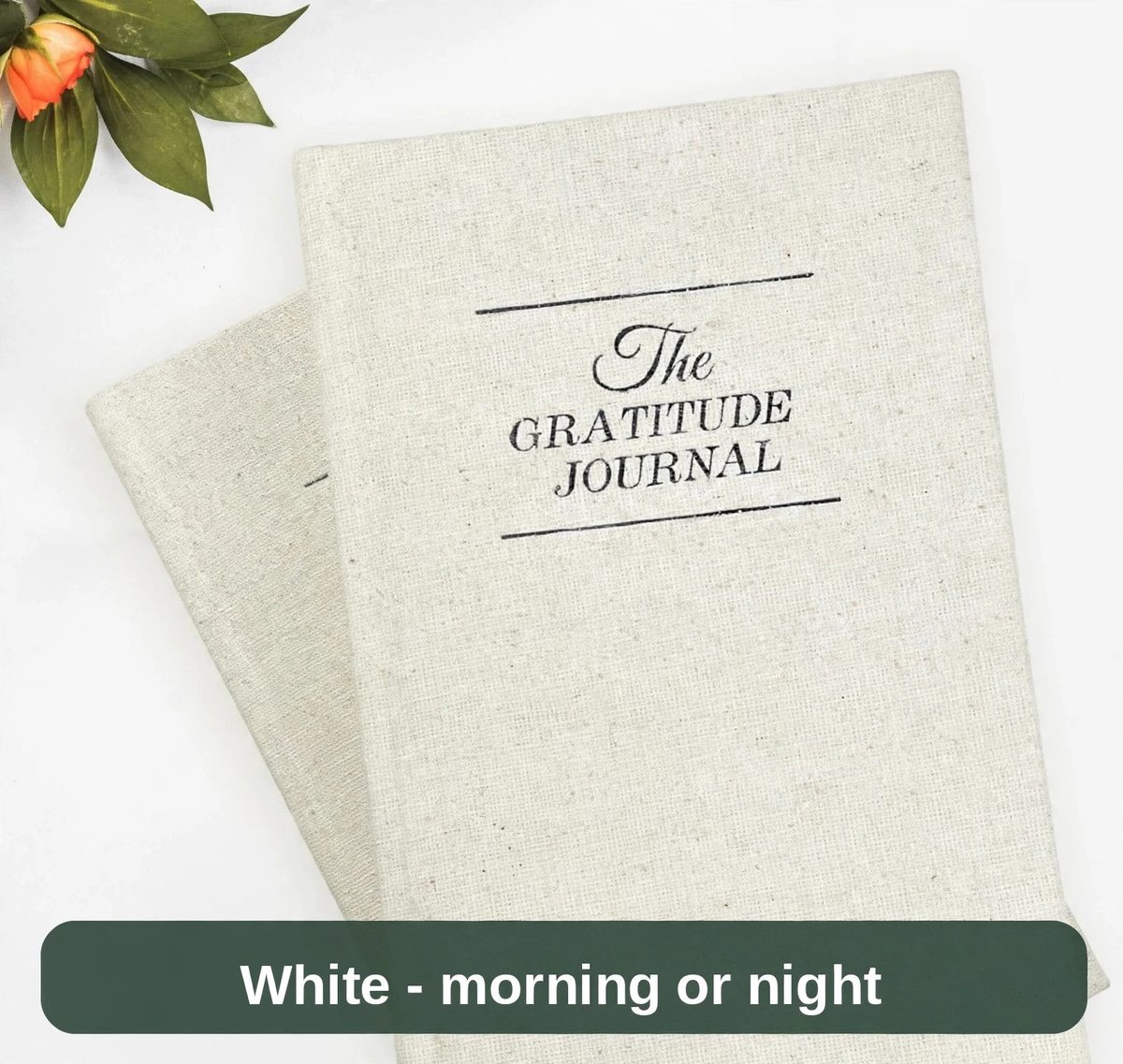 White Gratitude Journal shown with flowers - a calm little book for morning or night.