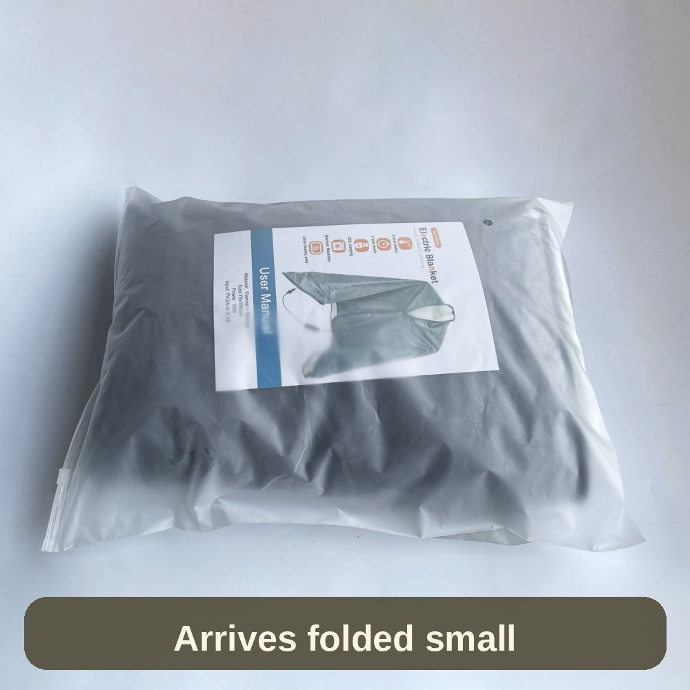 The heated blanket in its packaging - it arrives folded small, ready to plug in anywhere.