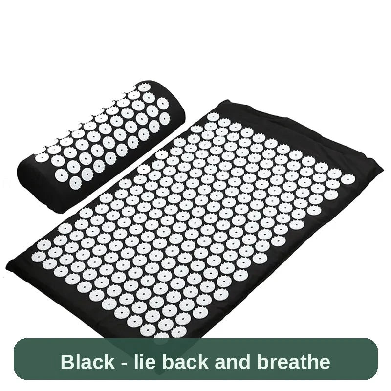 Black acupressure mat and pillow from another angle - lie back, breathe, and let the minutes pass.