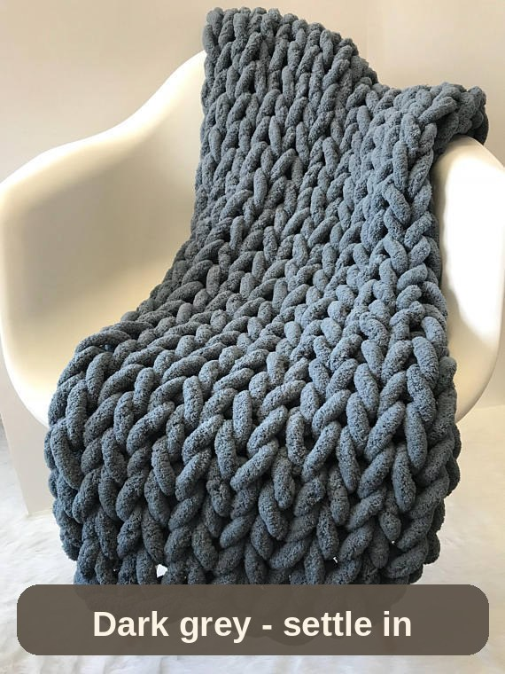 Dark grey weighted blanket over a lounge chair - settle in and feel the day slow down.