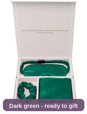 Dark green silk set in its gift box - rich colour, soft shine, ready for Christmas or a birthday.
