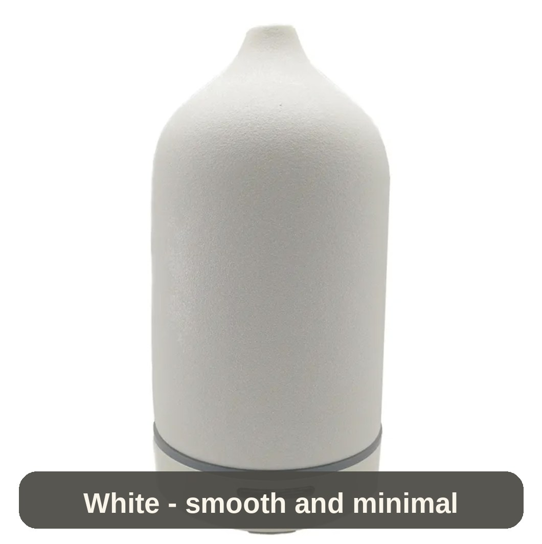 White Ceramic Diffuser from another angle - smooth, minimal and quietly elegant.