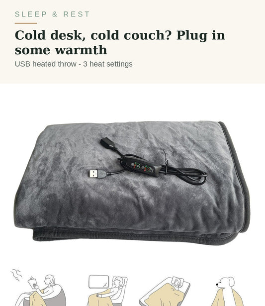 Grey USB heated blanket folded with its controller - plug in some warmth