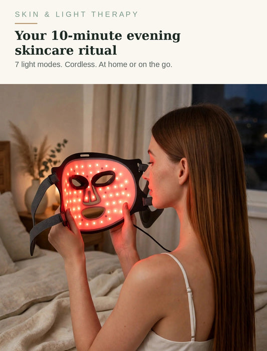 Woman relaxing at home wearing the 7-colour LED light therapy face mask during her evening skincare ritual