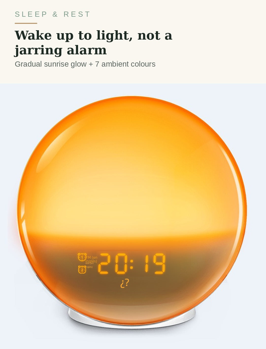 Sunrise Alarm Clock glowing at dawn beside a bed - wake up to light, not a jarring alarm